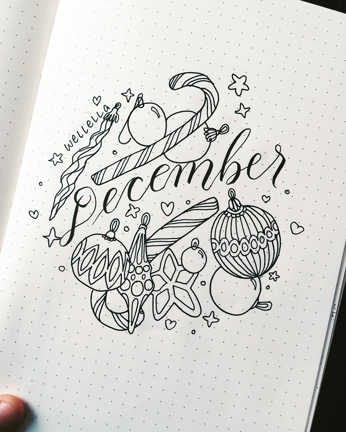 bullet journal cover page for the month of December with a Christmas theme